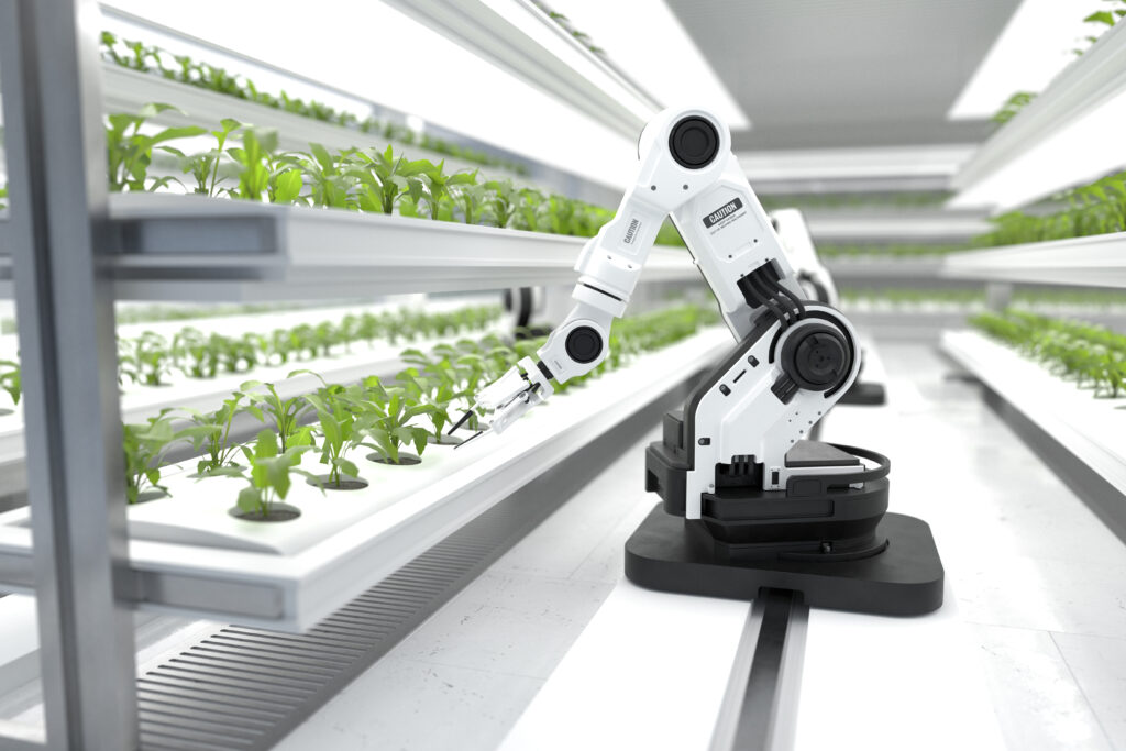 Smart robotic arm in a greenhouse taking care of plants